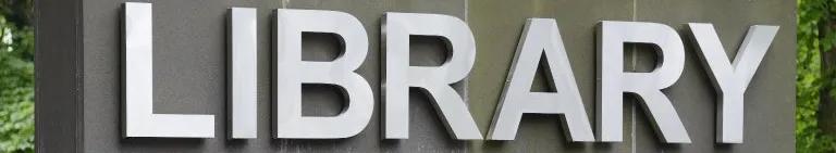 Sign in George Square with the word 'Library'