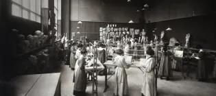 Old photograph of students working in a workshop