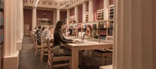 Law Library Senate Room table with students 