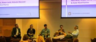 A photograph of the 2024 EORC2026 panel discussion on enacting culture change.