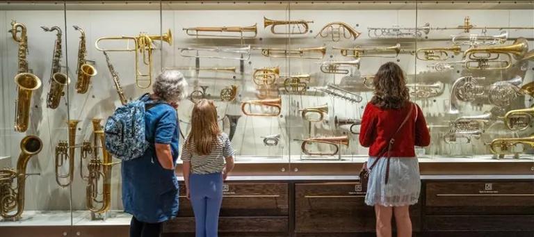 Image of people at St. Cecilia's Hall looking at instruments