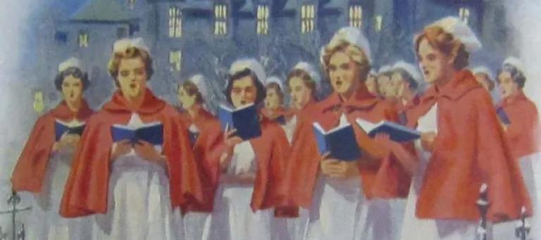 Postcard of nurses singing Christmas carols