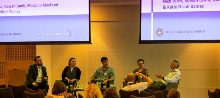 A photograph of the 2024 EORC2026 panel discussion on enacting culture change.