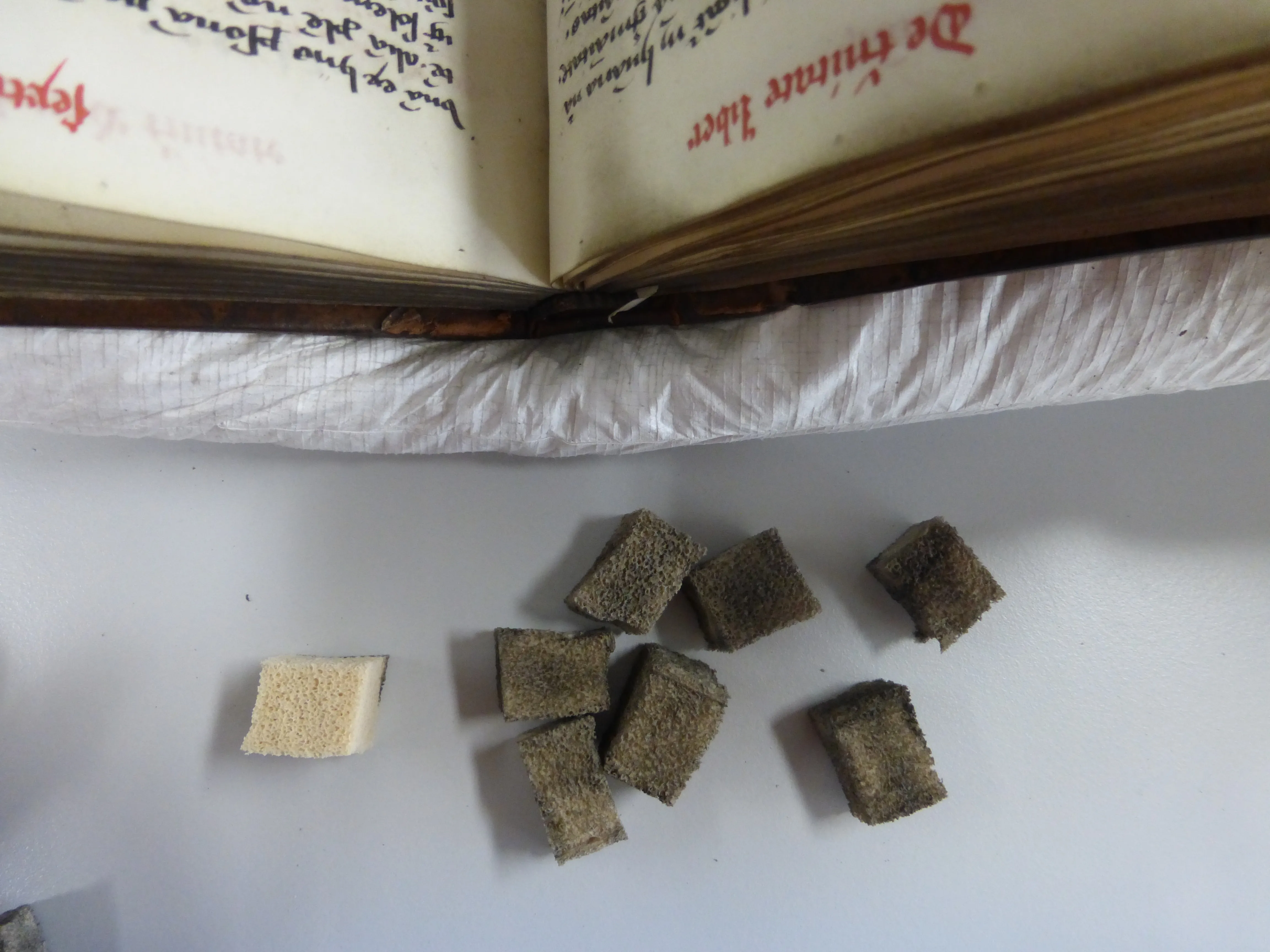 an old manuscript being cleaned