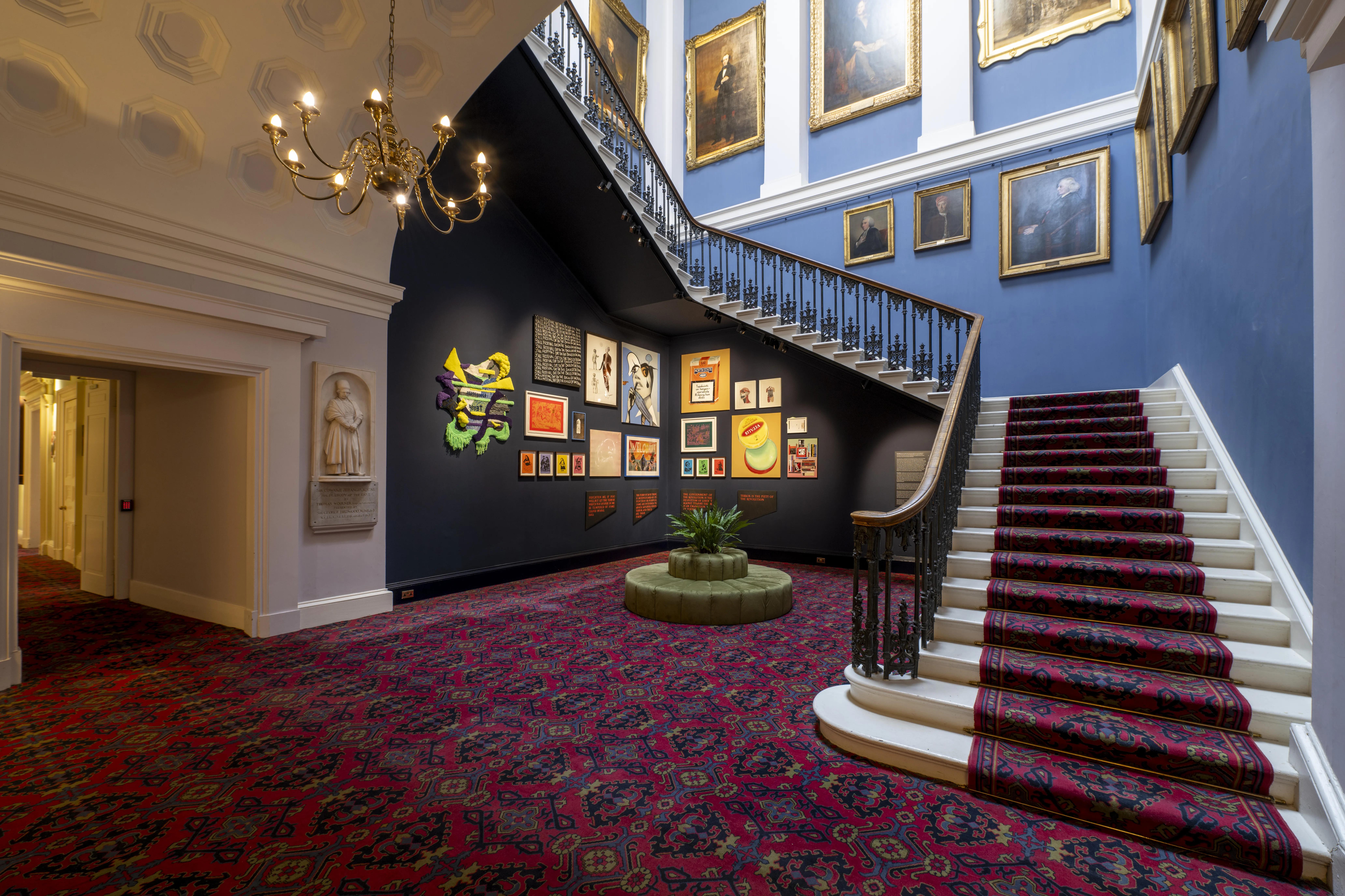 View of collection artworks in Old College stairwell