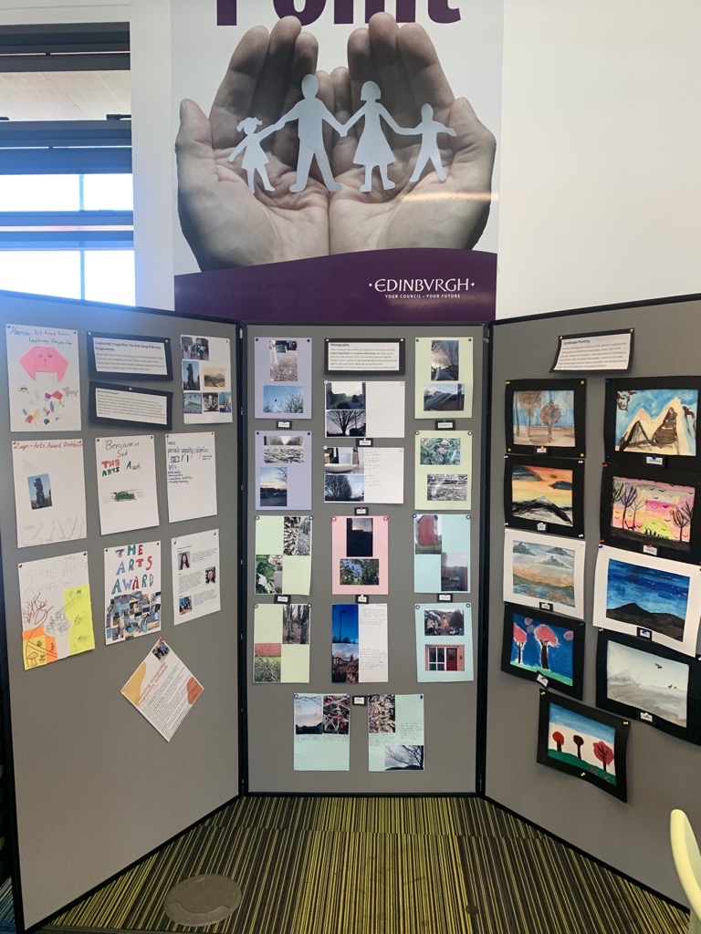 Display boards showing work created by participants of Capturing Craigmillar programme